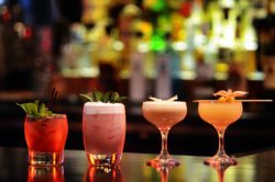cocktails sitting on bar